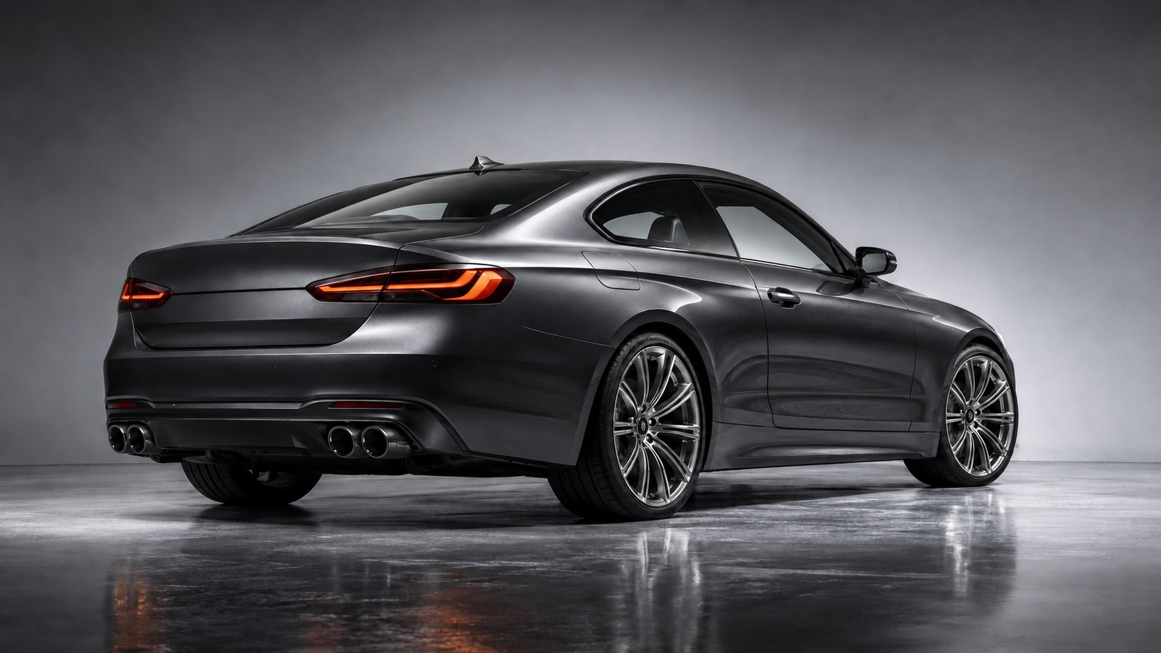 Metallic gunmetal-grey BMW coupe, rear three-quarter view with quad polished exhaust tips